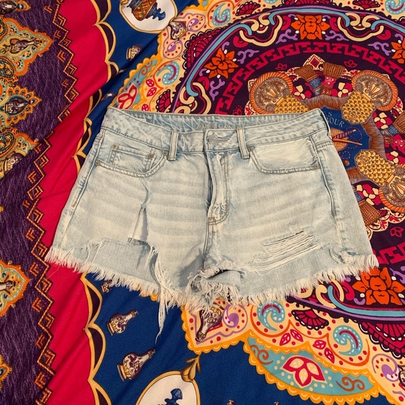 American Eagle light wash distressed jean shorts.